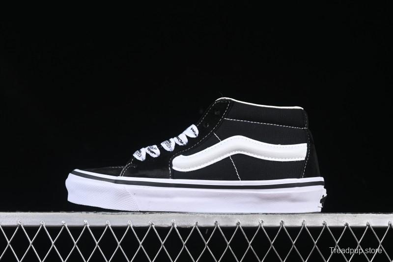 Vans HommeGirls x Vans Sk8-Mid Fashion Casual Mid-Top Canvas Sneakers with Bold Side Stripes - VN000NBNCJK
